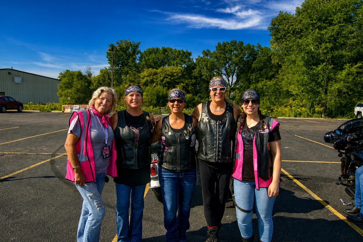 A group of women riders posing together