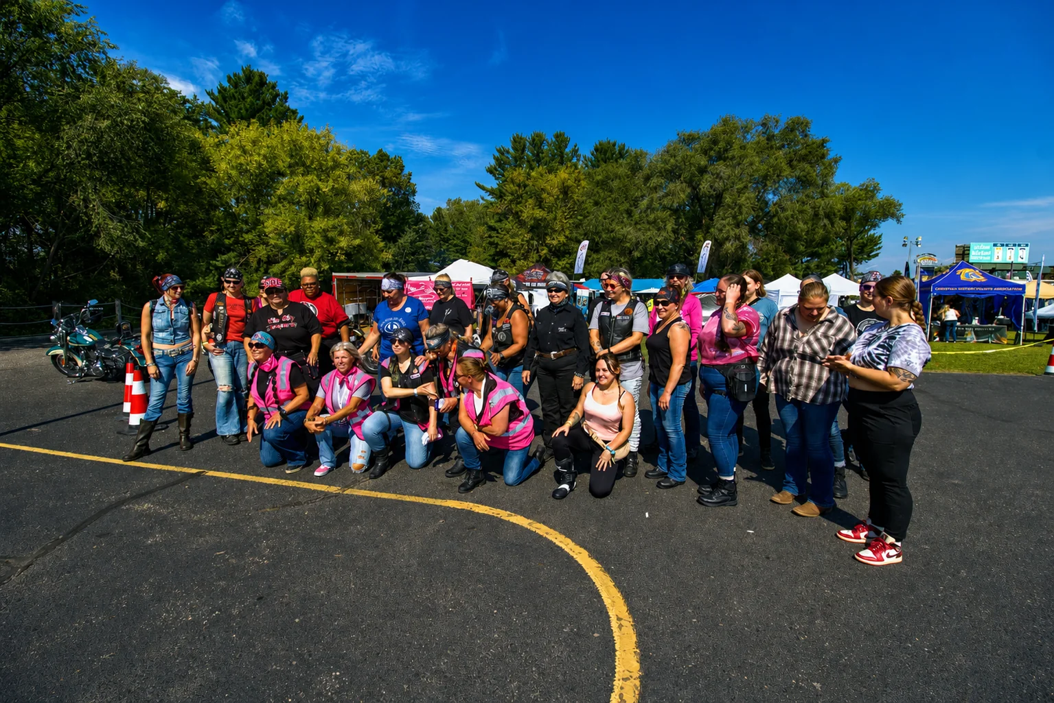 Large group of women gathered for a Bike Week portrait